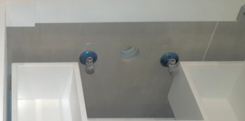 Drains and Water Feeds at Back of Vanity