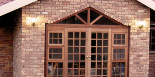 Complex Cottage Pane doors with sash windows