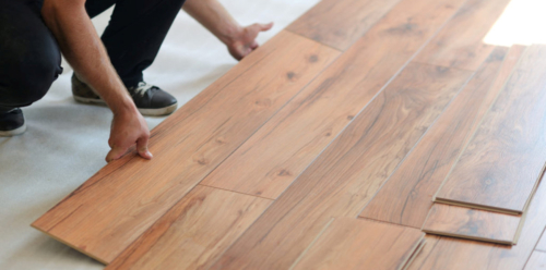 Installing laminate flooring in new home indoor