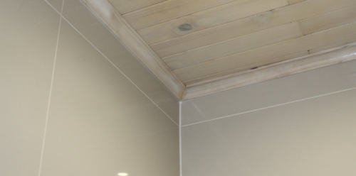 Lime washed knotty pine ceilings