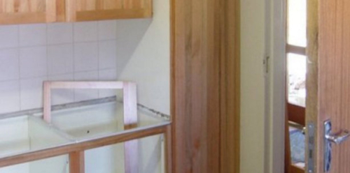 Oak Clad Fascias and New Grocery Cupboard