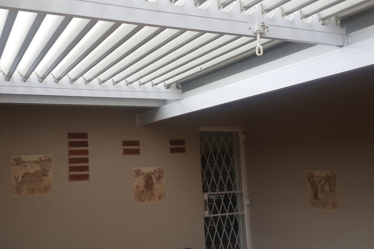 Patio Tile Feature and Louvered Roof Open