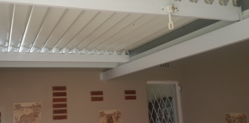 Patio Tile Feature and Louvered Roof