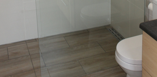 Sloped shower floor