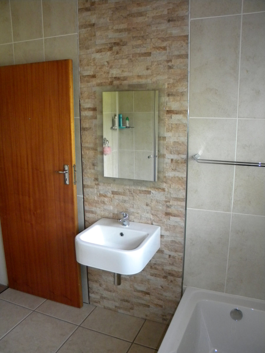 Wall Hung Basin and Feature Tiling